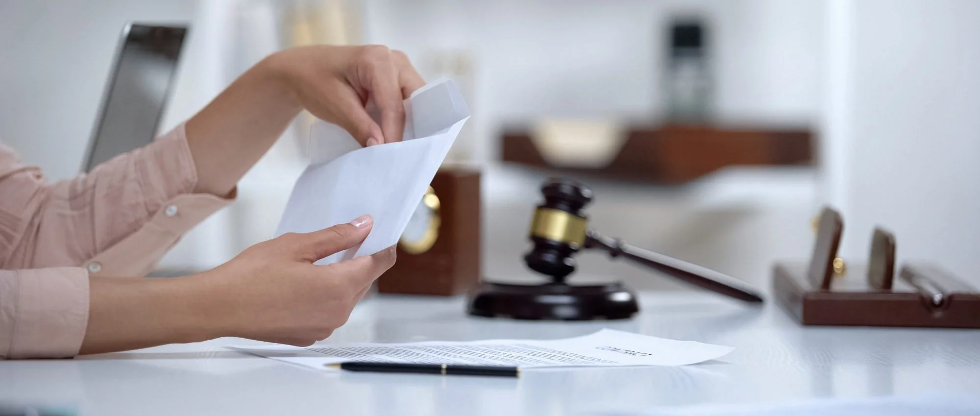 Opening letter beside gavel